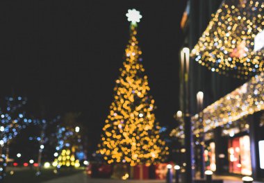 Noel dekorasyon arka plan ile parlayan altın ve mavi ışıklar