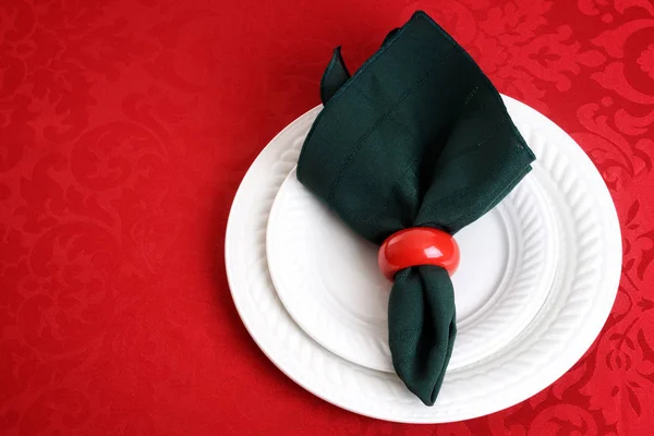 圣诞节的地方设置与绿色餐巾纸 — 图库照片