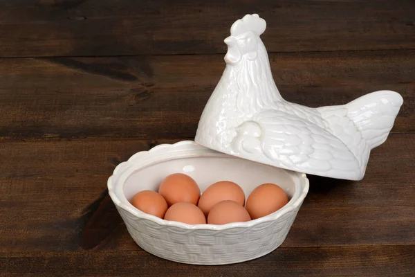 Victorian porcelain egg warmer chicken filled with eggs — Stock Photo, Image