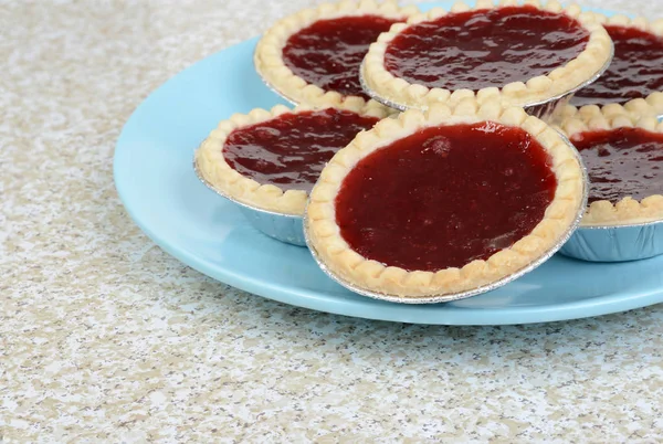 Closeup strawberry tarts on a plate — Stock Photo, Image