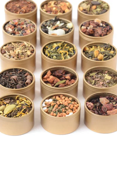 Closeup rows of organic herbal tea in tins — Stock Photo, Image
