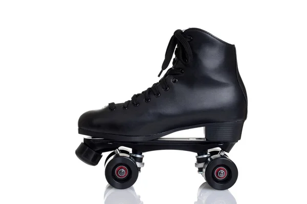 Vista lateral de los hombres quad roller skate —  Fotos de Stock