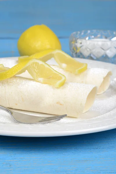 Two lemon crepes on plate — Stock Photo, Image