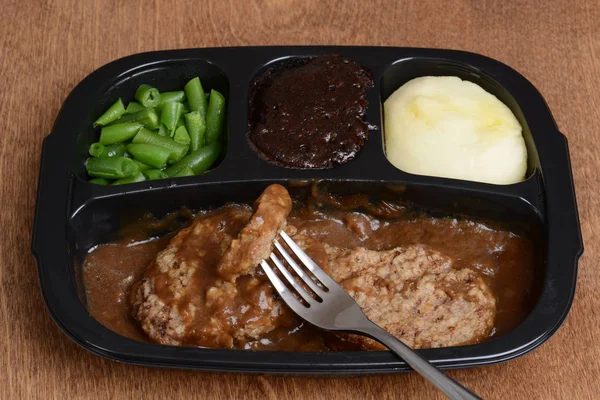 Salisbury steak tv dinner with a fork — Stock Photo, Image