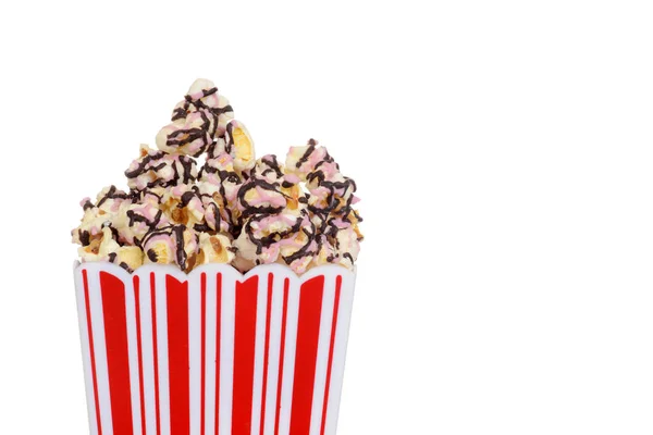 Primo piano contenitore di popcorn al lampone al cioccolato — Foto Stock