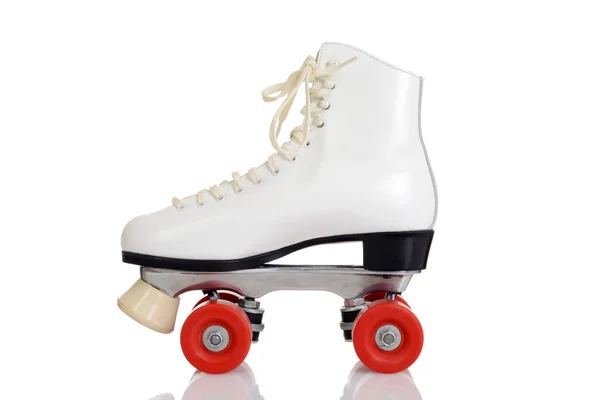 Vista lateral de las mujeres blanco quad roller skate — Foto de Stock