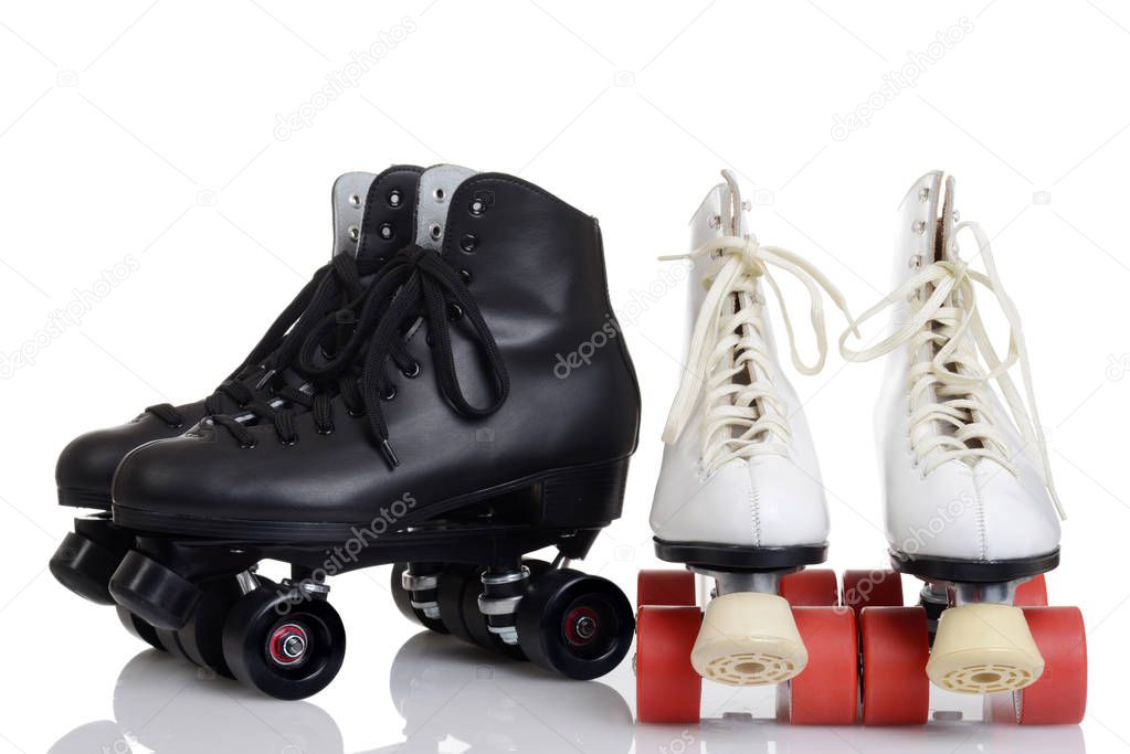 two pairs quad roller skates