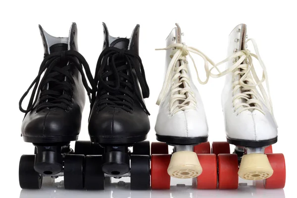 Vista frontal de los hombres y las mujeres patines quad — Foto de Stock