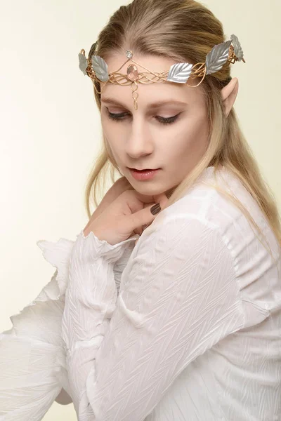 Portrait of female elf with gold and silver crown — Stock Photo, Image