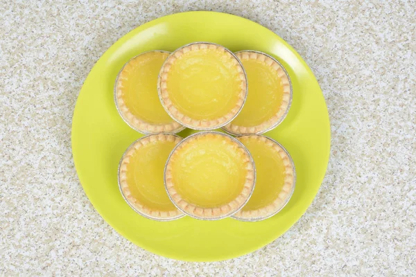 Tortas de limão vista superior na placa — Fotografia de Stock