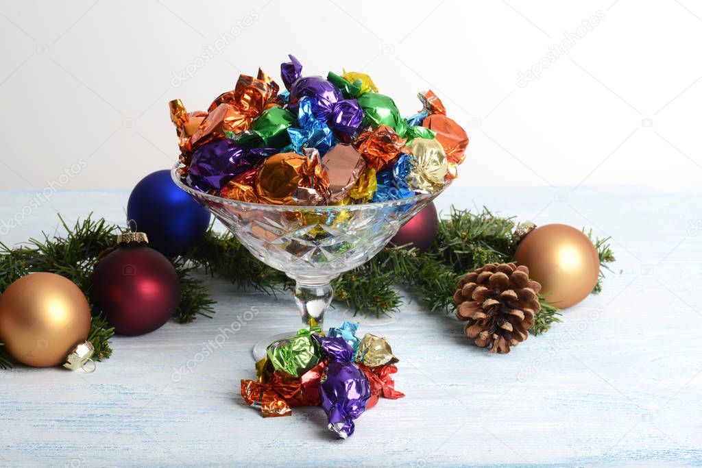 crystal bowl of christmas chocolates with ornaments