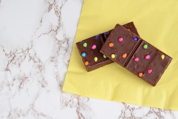 Top View Chocolate Fudge Brownies Yellow Napkin — Stock Photo, Image