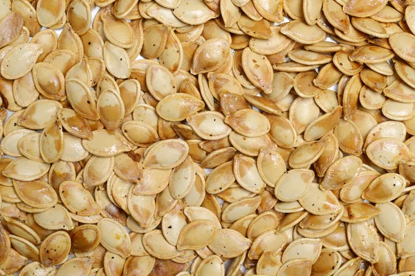Closeup Salted Roasted Pumpkin Seeds Background — Stock Photo, Image