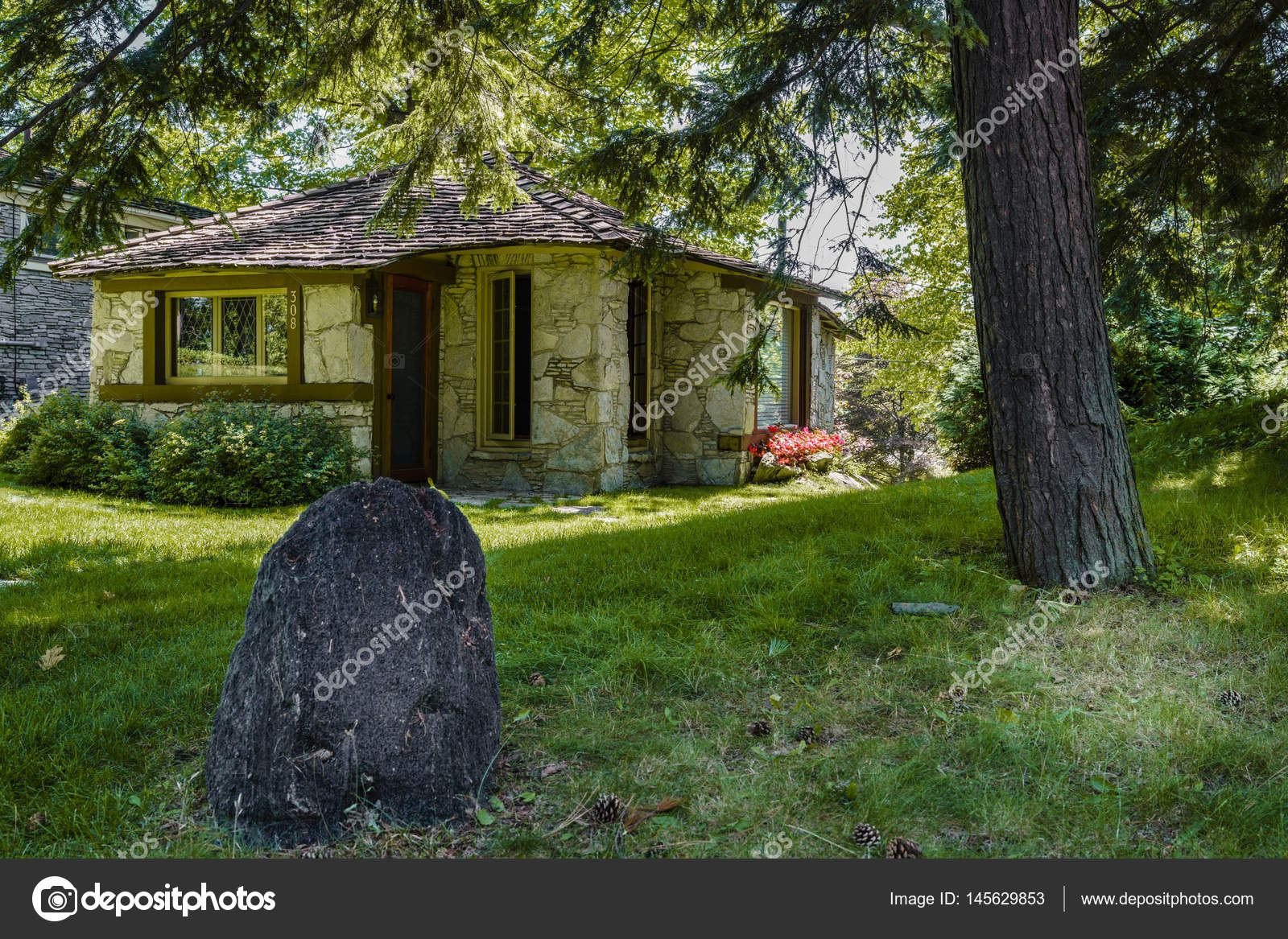 Unique hobbit home in forest Stock Editorial Photo © alexeys 145629853