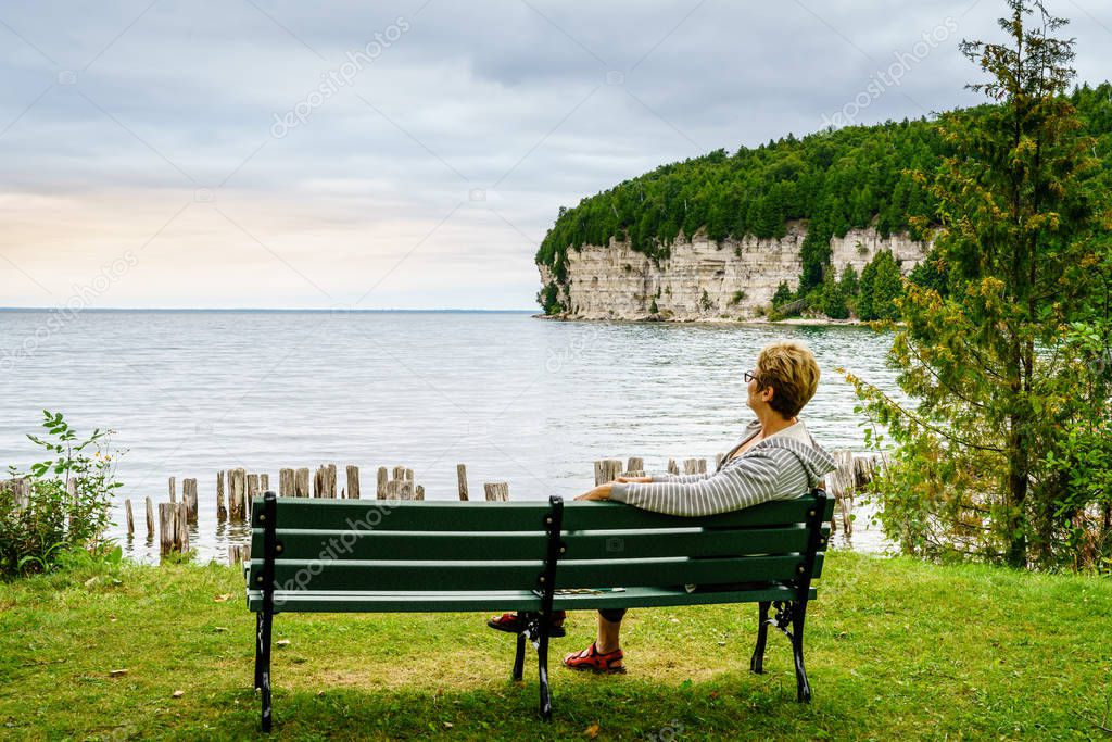 Woman relaxing on bench