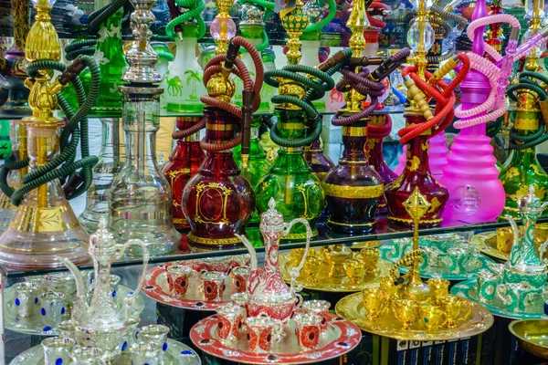 Hookahs on glass shelf in store — Stock Photo, Image