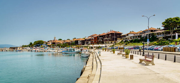 Nessebar, Bulgaria, June 27, 2017: Promenade along the Black Sea coast in resort town of  Nessebar, Bulgaria