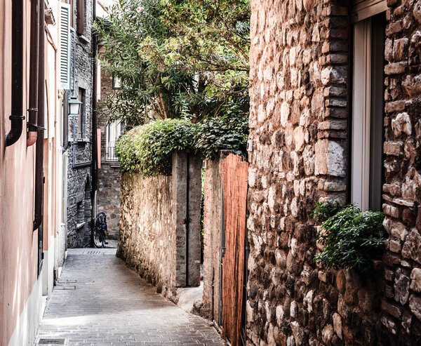 An old residential street in the town of Sirmione in Lombardy, Italy
