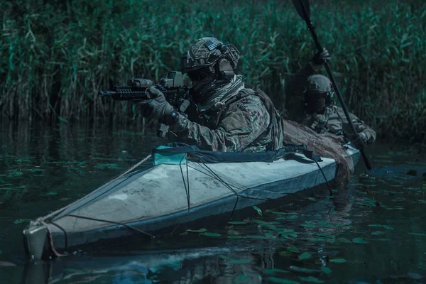 Spec ops in the military kayak — Stock Photo, Image