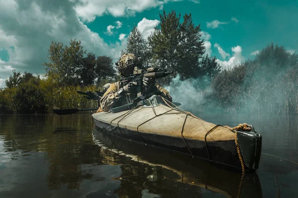 Spec ops in the military kayak — Stok Foto