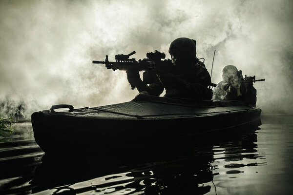 Militants in army kayak