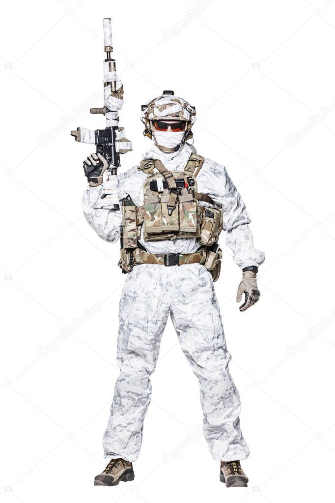 Special forces operator in winter camo clothes