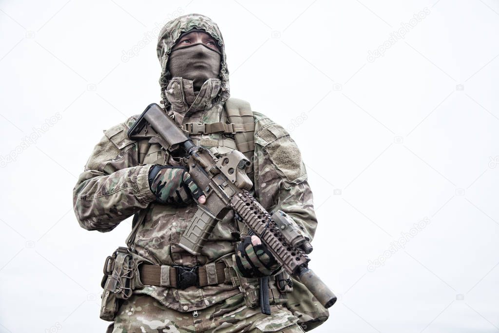 Portrait of modern army infantryman on march
