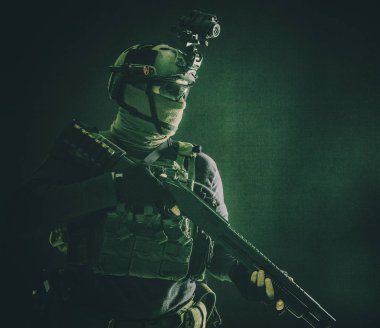 Army elite troops soldier low key studio portrait