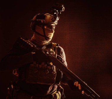 Army elite troops soldier low key studio portrait