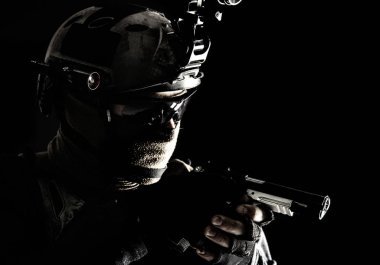 Police SWAT team fighter aiming service pistol