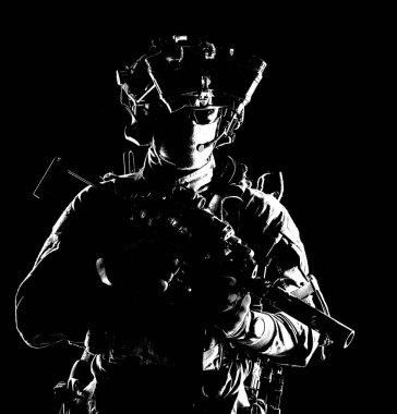 Modern army elite forces shooter in darkness