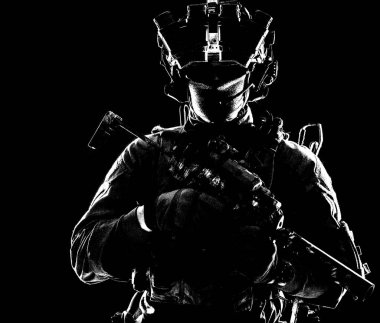 Modern army elite forces shooter in darkness