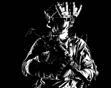 Modern army elite forces shooter in darkness