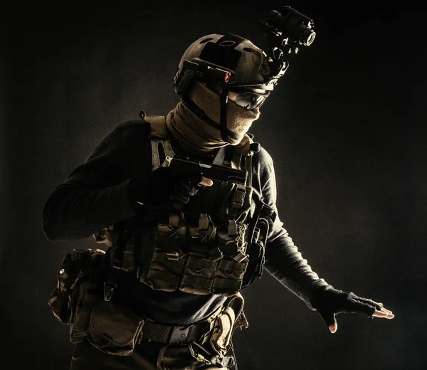 Army infantryman moving in darkness with caution — Stok fotoğraf