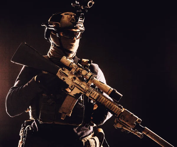 Army marksman with sniper rifle in darkness — Stock Photo, Image