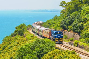 scenery of southern taiwan with railway and train clipart