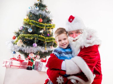 Noel Baba ile küçük çocuk