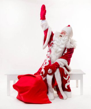 Noel Baba bankta oturan