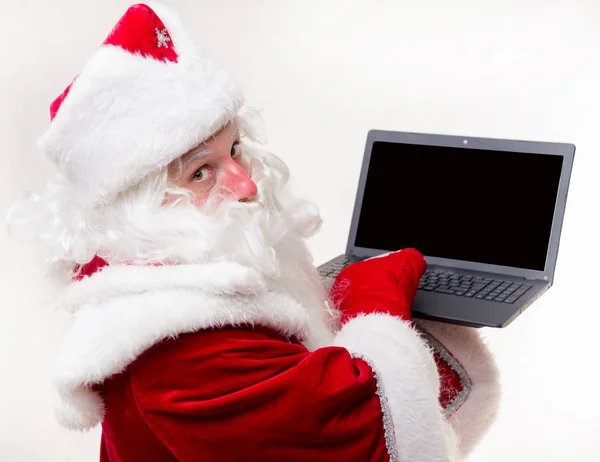Noel Baba ile laptop — Stok fotoğraf