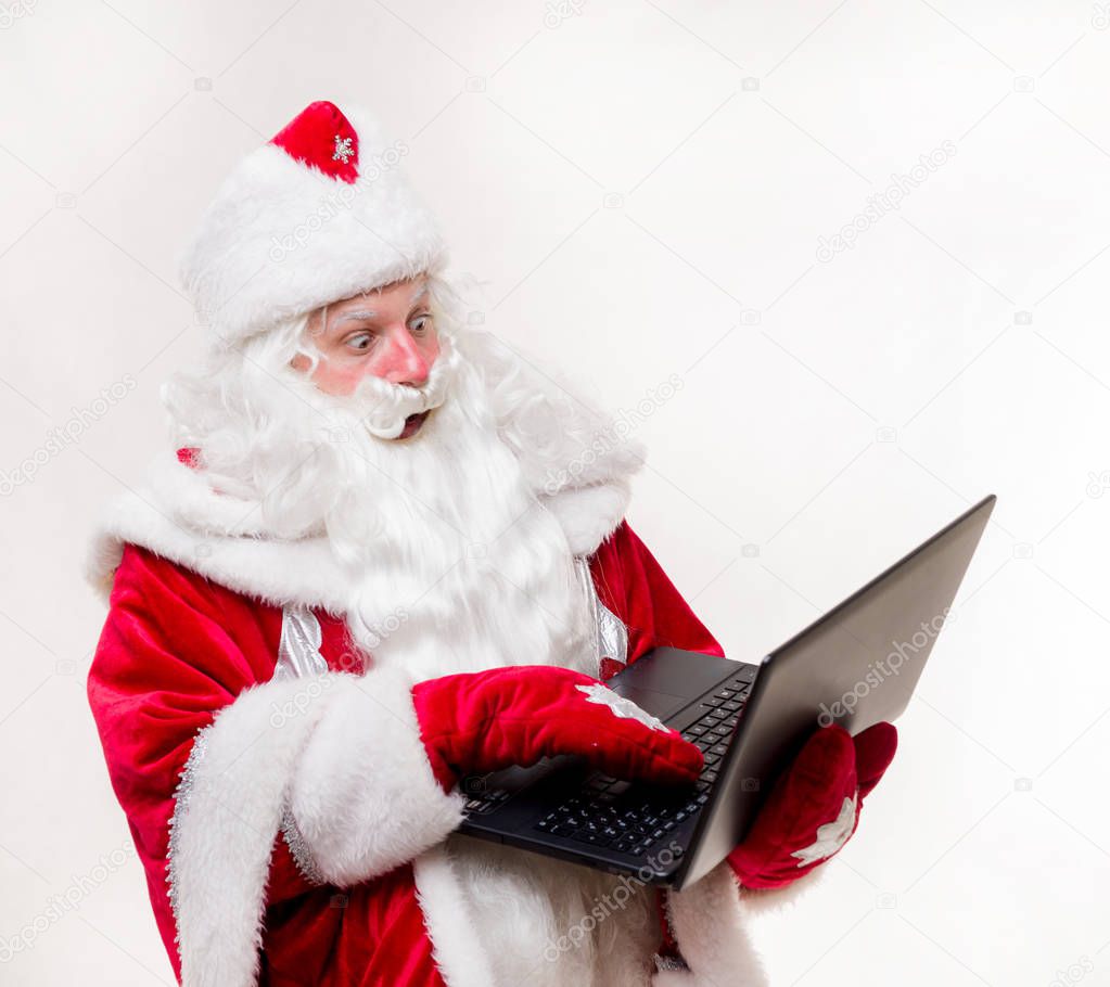 Santa Claus with laptop