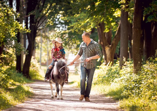 Little Girl Cowboy Hat Riding Pony Her Father Park — Stock Photo, Image