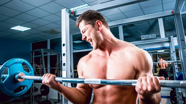 Gespierde Jongeman Sportschool Met Barbell — Stockfoto