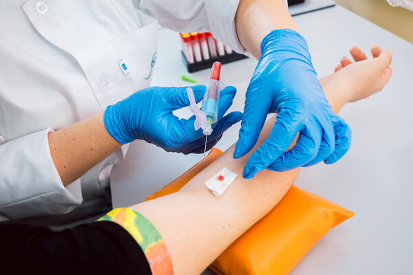 Medical equipment. Syringe in the hand. Blood test