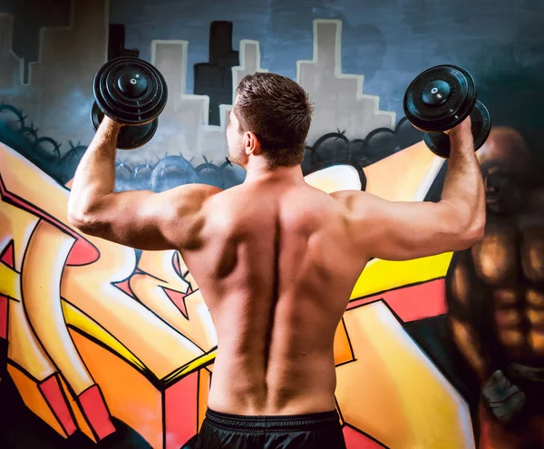 Young Muscular Man Barbells Graffiti Wall — Stock Photo, Image