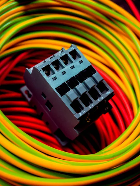 Close up of electrical equipment. Multicolored cables.
