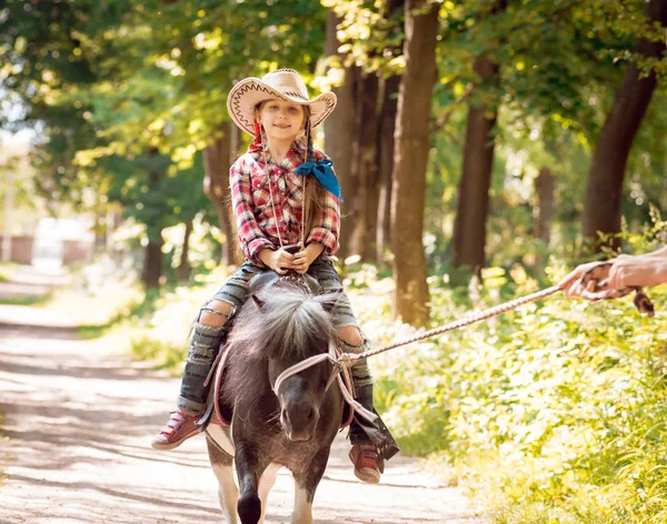 Little Girl Braids Cowboy Hat Riding Pony Park — Stock Photo, Image