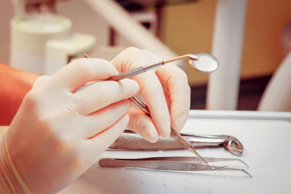 Medical equipment in the hands. Dental office