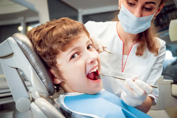 Little boy at the dental office. Calm and happy