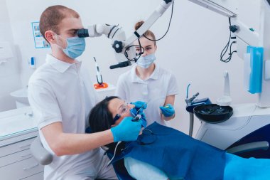 Endodontik tedavi sırasında obturation kök kanal. Modern teknoloji
