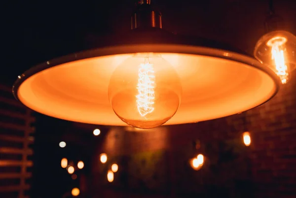 Closeup of loft pendant lamp with edison light bulb